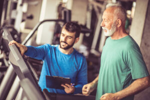 senior on exercise machine