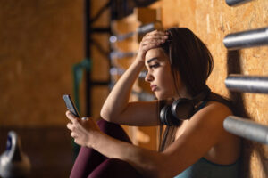 in the gym on the phone