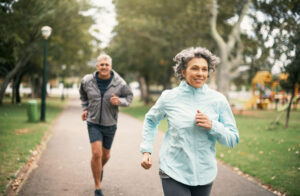 senior couple running